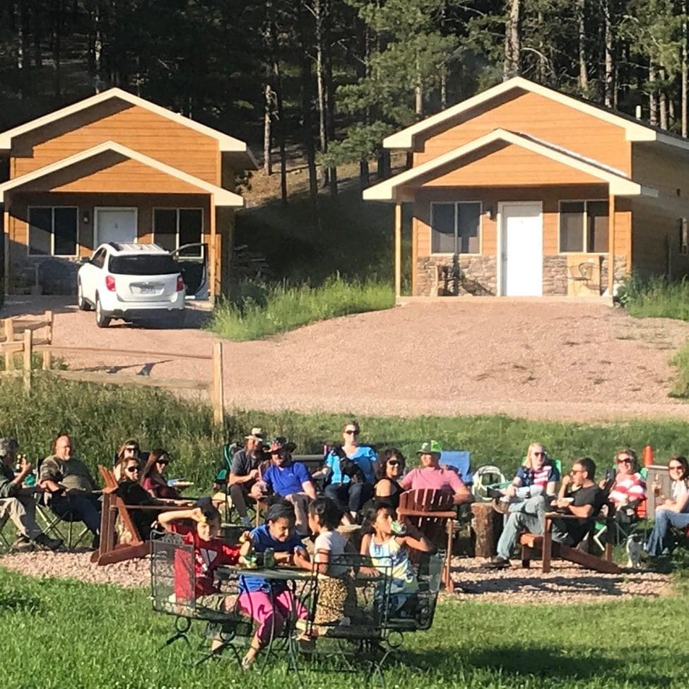 group enjoying the fire pit and sitting area
