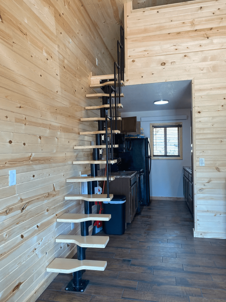 Staircase to the loft in the 300sq ft deluxe cabins